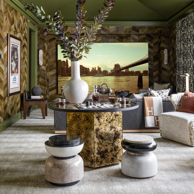 screening area a massive lg home cinema takes up a whole wall and even works in full sun the acoustics are enhanced by a snakeskinpattern wall to wall carpet from fibreworks