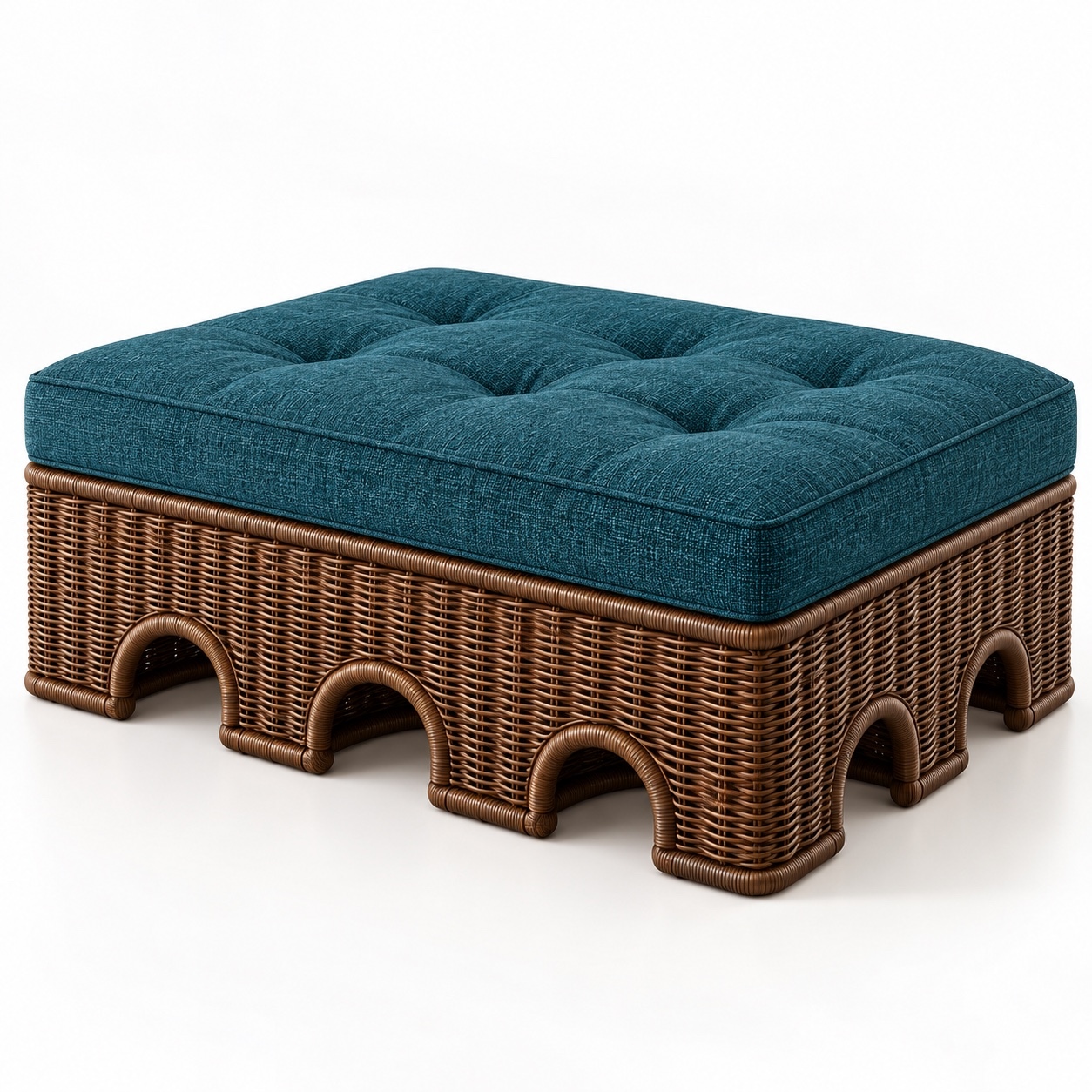 AQWAS Ottoman 1 AQWAS hand-woven rattan ottoman with a teal button-tufted cushion and arched base, designed by Jamela Alawneh